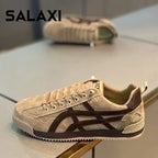 Tênis slip-on de lona branca respirável para homens